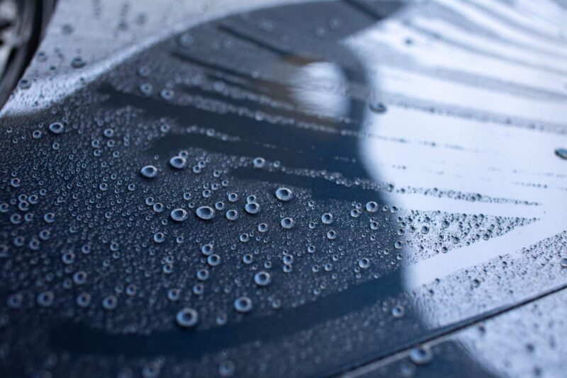 Water repellent car hood with nano ceramic spray