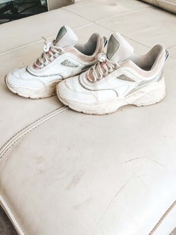 Dirty white leather & textile shoes that needs cleaning